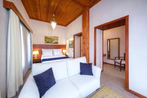 Postel nebo postele na pokoji v ubytování Hotel Bosnali