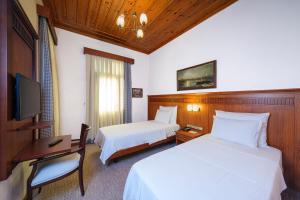 TV a/nebo společenská místnost v ubytování Hotel Bosnali