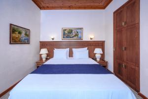 Postel nebo postele na pokoji v ubytování Hotel Bosnali