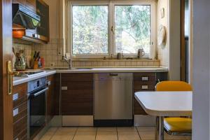 Kuchyň nebo kuchyňský kout v ubytování GLC Gauting Living Comfortable 100