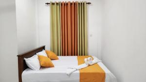 Tempat tidur dalam kamar di Calm Guest