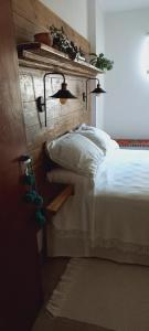 Postel nebo postele na pokoji v ubytování Aeropuerto a 5' y Ruta del Vino a 100 mts