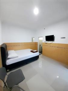 TV a/nebo společenská místnost v ubytování Hotel Srikandi Baru