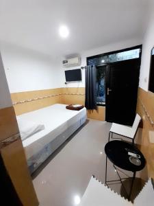 TV a/nebo společenská místnost v ubytování Hotel Srikandi Baru + 6 fotografií
