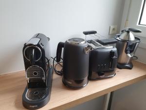 Kaffemaskin og/eller vannkoker på Magnifique appartement avec garage privé et terrasse