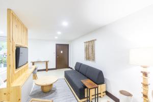 TV a/nebo společenská místnost v ubytování Paradise Bay Hotel Boutique