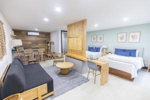 Postel nebo postele na pokoji v ubytování Paradise Bay Hotel Boutique