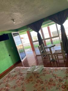 Posezení v ubytování Cabañas y Habitaciones El Malecón