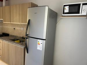 A kitchen or kitchenette at Norden I - Departamento a estrenar con Estacionamiento Privado