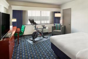 a hotel room with a bike in a room at Courtyard Arlington Crystal City/Reagan National Airport in Arlington