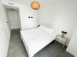 Ένα ή περισσότερα κρεβάτια σε δωμάτιο στο Relaxing Calpe Luxury Vacation +19 φωτογραφίες