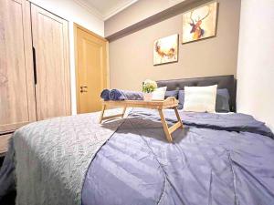 מיטה או מיטות בחדר ב-RnF Princess Cove romantic unit by CK Group