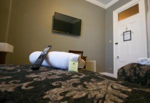 Postel nebo postele na pokoji v ubytování Royal Hotel Guyra