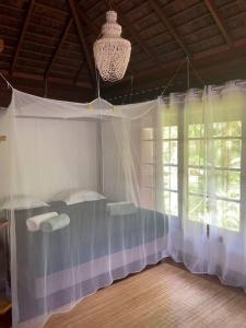 A bed or beds in a room at Villa JoMana