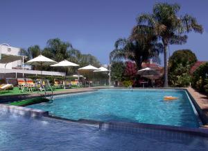 The swimming pool at or close to Hotel Capvio