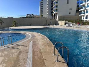Bazén v ubytovaní App. Meeres Blick Eşin Golf Resort alebo v jeho blízkosti