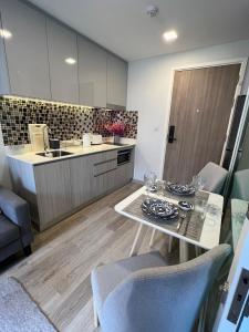 A kitchen or kitchenette at Marvest Condo Hua Hin