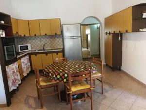 Kuchyň nebo kuchyňský kout v ubytování Casa vacanze Mandriola Putzuidu Capo Mannu + 16 fotografií