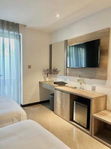 TV/trung tâm giải trí tại La Sera Suites Nha Trang