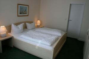 Postel nebo postele na pokoji v ubytování Studio für 4 Personen mit Du/WC