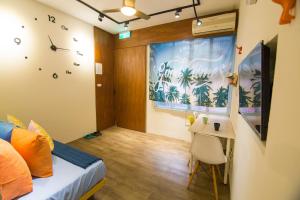 TV o dispositivi per l'intrattenimento presso One Heart Inn