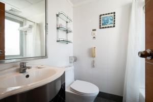 Vannituba majutusasutuses Yihe Hotel Ouzhuang