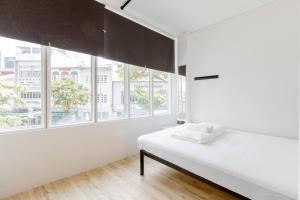 Postel nebo postele na pokoji v ubytování RadZone Hostel