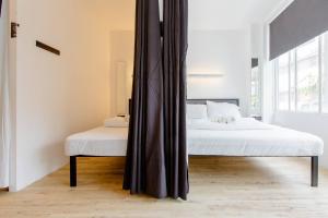 Postel nebo postele na pokoji v ubytování RadZone Hostel