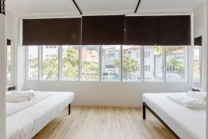 Postel nebo postele na pokoji v ubytování RadZone Hostel