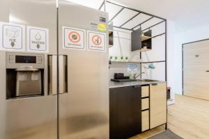 Kuchyň nebo kuchyňský kout v ubytování RadZone Hostel