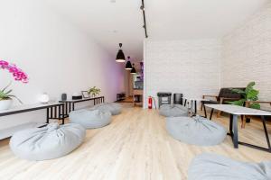 a room with four bean bags on the floor at RadZone Hostel in Singapore