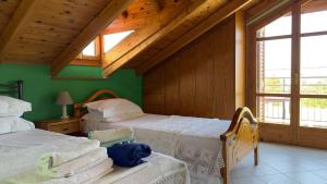 Posteľ alebo postele v izbe v ubytovaní Loft apartment 20m from sea