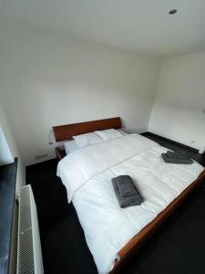 Posteľ alebo postele v izbe v ubytovaní Tehuizen Alness