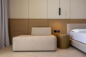 Voodi või voodid majutusasutuse BEYOND A Luxury Boutique Hotel toas
