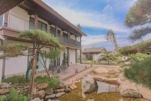 Κήπος έξω από το Yuncheng Yunxi Furusato-Banma Resort