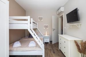 Postel nebo postele na pokoji v ubytování Villa Emma Pag