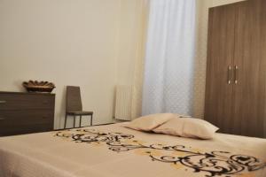 Ein Bett oder Betten in einem Zimmer der Unterkunft B&B Venti del Sud