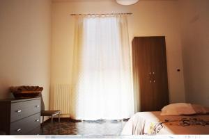 Ein Bett oder Betten in einem Zimmer der Unterkunft B&B Venti del Sud