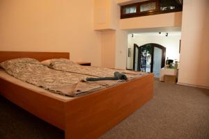 Giường trong phòng chung tại Old Town Plovdiv House Стаи за гости Марчеви - Стария град Пловдив