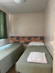 Posteľ alebo postele v izbe v ubytovaní Villaggio Mithos