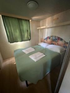 Posteľ alebo postele v izbe v ubytovaní Villaggio Mithos