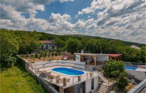 an aerial view of a house with a swimming pool at Villa Ancora in Jadranovo