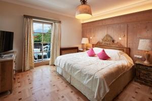 Posteľ alebo postele v izbe v ubytovaní Relais & Châteaux Hotel Tennerhof