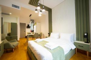 Легло или легла в стая в Monev Suites Hotel