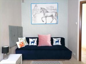 Część wypoczynkowa w obiekcie Metro Wilson Apartment