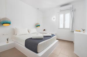 Letto o letti in una camera di VOCA HOTEL & SUITES