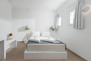 Letto o letti in una camera di VOCA HOTEL & SUITES