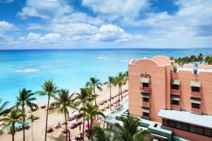 a view of the beach and the ocean from the resort at The Royal Hawaiian, A Luxury Collection Resort, Waikiki in Honolulu