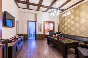 TV a/nebo společenská místnost v ubytování Hotel House