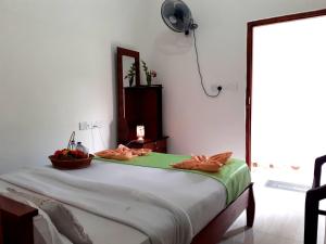 Postel nebo postele na pokoji v ubytování Subash Hotel